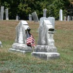 2 unique-styled headstones